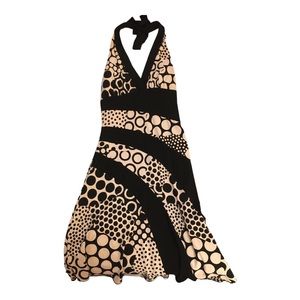 Womens  v-cut halter dress with asymmetrical length. Size small.